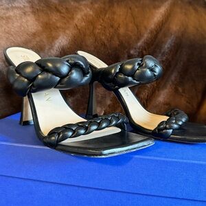 Black size 40.5 Stuart Weitzman open toed heeled sandal.